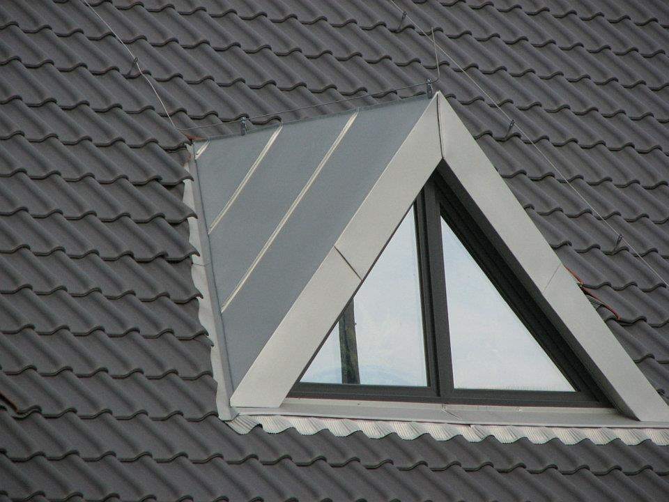 dekarz, dekarstwo, usługi dekarskie, rąbek stojący rheinzink, producent rąbka stojącego