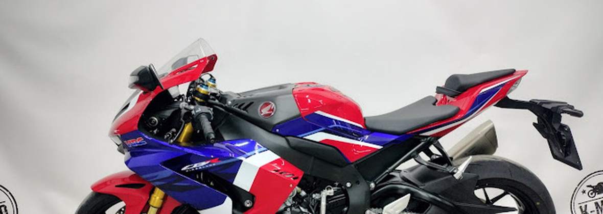 K - Moto Karol Bitner